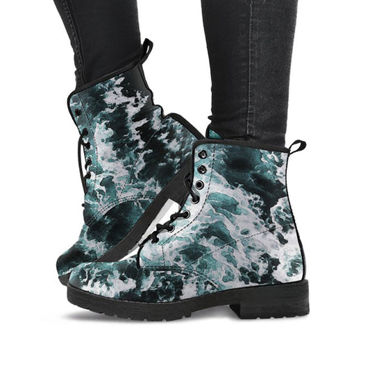 Dark teal printed boots with abstract ocean wave artwork